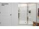 All-white bathroom shower is a clean and functional space with shelves for storage and easy access at 1023 Hostler Ln, York, SC 29745
