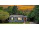 Charming single-story home featuring a red front door and manicured landscaping at 1100 Mona Dr, Charlotte, NC 28206