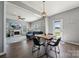 Open-concept dining area seamlessly connects to the cozy living room with a fireplace and ample natural light at 1180 Bannockburn Ave, Rock Hill, SC 29732