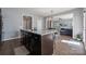 Bright and airy kitchen with a breakfast bar that opens to a living room and outdoor patio at 1180 Bannockburn Ave, Rock Hill, SC 29732