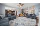 Open-concept living room with hardwood floors and comfortable sofas at 1180 Bannockburn Ave, Rock Hill, SC 29732