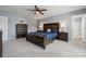 The main bedroom features a ceiling fan, carpet, and an ensuite bathroom with a glass shower at 1180 Bannockburn Ave, Rock Hill, SC 29732