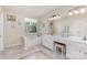 Bright bathroom with a jacuzzi tub and vanity at 11807 Hawick Valley Ln, Charlotte, NC 28277