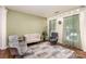 Cozy living room with plush seating, a neutral color palette, and ample natural light at 11807 Hawick Valley Ln, Charlotte, NC 28277