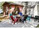 Outdoor patio with a fire pit, comfortable seating, and a gazebo covered with pink curtains at 11807 Hawick Valley Ln, Charlotte, NC 28277