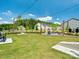 Community green space featuring a fire pit, corn hole, and seating, ideal for outdoor recreation at 119 Berkeley Ave # A, Mooresville, NC 28117