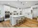 Spacious kitchen with white cabinetry, stainless steel appliances, and a large center island at 119 Berkeley Ave # A, Mooresville, NC 28117