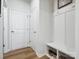 Functional mudroom area with built-in bench, shoe storage, and convenient access to the home at 119 Berkeley Ave # A, Mooresville, NC 28117