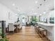 Spacious open layout with kitchen island, dining area, and living room creates an inviting atmosphere at 119 Berkeley Ave # A, Mooresville, NC 28117