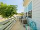 Charming outdoor patio with seating, a white fence, and lush greenery at 119 Berkeley Ave # A, Mooresville, NC 28117