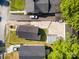Aerial view of a home with fenced backyard, carport, and alley access in a mature neighborhood at 1211 N Boyce St, Gastonia, NC 28052