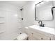 The bathroom features all new white fixtures and surfaces at 1211 N Boyce St, Gastonia, NC 28052