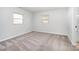 This bedroom features neutral carpet, paint, two windows, and is ready for you to add your personal touches at 1211 N Boyce St, Gastonia, NC 28052