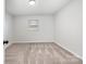 This bedroom features neutral carpet, paint, one window, and is ready for you to add your personal touches at 1211 N Boyce St, Gastonia, NC 28052