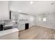 Modern, updated kitchen with stainless appliances, white cabinetry, and a light and airy feel at 1211 N Boyce St, Gastonia, NC 28052