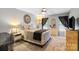 Comfortable bedroom with neutral tones, ceiling fan, and carpet flooring at 1261 Hawthorne Dr, Indian Trail, NC 28079