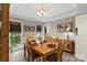 Bright dining room featuring a wood table, stylish chairs, and modern decor at 1261 Hawthorne Dr, Indian Trail, NC 28079