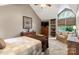Spacious main bedroom suite with vaulted ceilings, sitting area, and neutral color palette at 1261 Hawthorne Dr, Indian Trail, NC 28079