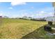 Expansive grassy backyard offering ample space for recreation and outdoor activities, perfect for relaxation and entertainment at 1270 Winding Creek Rd, Salisbury, NC 28146