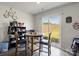 Charming dining area with a round table, cozy seating, and sliding doors offering views of the backyard at 1270 Winding Creek Rd, Salisbury, NC 28146