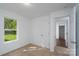 Bedroom with carpet and large window at 1411 Caldwell St, Gastonia, NC 28052