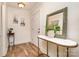 Bright entryway featuring wood floors and stylish accents at 145 Driftwood Dr, Mooresville, NC 28117