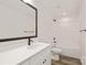Modern bathroom features a sleek vanity with black hardware and a shower with tub combo at 1837 Bear St, Charlotte, NC 28214