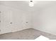 Bedroom featuring neutral carpet, recessed lighting, and double closets at 1837 Bear St, Charlotte, NC 28214