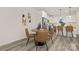 Cozy dining area with modern table, chairs, and decor next to the modern kitchen at 1837 Bear St, Charlotte, NC 28214