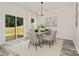 Elegant dining room with sliding door access to backyard, perfect for entertaining at 1837 Bear St, Charlotte, NC 28214