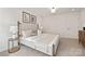 Comfortable main bedroom featuring natural light, neutral tones, and cozy furniture at 1837 Bear St, Charlotte, NC 28214