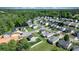 Aerial view of a peaceful residential neighborhood featuring well-maintained homes and lush greenery at 1925 Maius Dr # 30, Conover, NC 28613