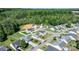 Aerial view of a quiet neighborhood featuring modern homes, well-maintained lawns, and tree-lined streets at 1925 Maius Dr # 30, Conover, NC 28613