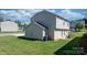 Backyard view of the home featuring a patio with outdoor seating and a spacious lawn at 1925 Maius Dr # 30, Conover, NC 28613