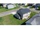 Aerial view of a home's backyard with a small patio and well-maintained lawn at 1925 Maius Dr # 30, Conover, NC 28613