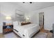 Comfortable bedroom with a queen bed, warm lighting, and a neutral color palette at 1925 Maius Dr # 30, Conover, NC 28613