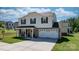 Charming two-story home with a two car garage and a welcoming front porch in a well-manicured lawn at 1925 Maius Dr # 30, Conover, NC 28613