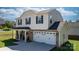 Charming two-story home with a two car garage and a welcoming front porch in a well-manicured lawn at 1925 Maius Dr # 30, Conover, NC 28613