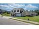 Charming two-story home featuring a two-car garage, well-kept lawn, and inviting front porch at 1925 Maius Dr # 30, Conover, NC 28613