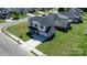 Charming two-story home with a manicured lawn and attached garage in a suburban setting at 1925 Maius Dr # 30, Conover, NC 28613