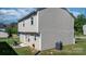 Rear view of home with vinyl siding and a small patio area for outdoor enjoyment at 1925 Maius Dr # 30, Conover, NC 28613