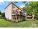 Multi-level deck and patio in backyard provide space for entertaining outdoors at 1929 Faison Ave, Fort Mill, SC 29708