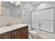 Bathroom featuring a single sink vanity and a shower with a glass door at 1929 Faison Ave, Fort Mill, SC 29708