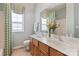 Bathroom with double vanity, tile floor, and decor at 1929 Faison Ave, Fort Mill, SC 29708
