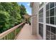 A covered deck has an iron railing and is adjacent to the main building at 1929 Faison Ave, Fort Mill, SC 29708