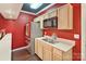This kitchen features stainless steel appliances, wood cabinets, and a double sink at 1929 Faison Ave, Fort Mill, SC 29708