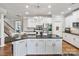 Bright kitchen featuring granite countertops, stainless steel appliances, and ample storage at 1929 Faison Ave, Fort Mill, SC 29708