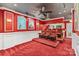 This home theater boasts tiered seating, a projector, and a snack bar with small kitchen at 1929 Faison Ave, Fort Mill, SC 29708