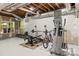 Basement gym with workout equipment and a window at 1956 Forest Ridge Dr, Stanley, NC 28164