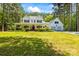 Beautiful two story home featuring a welcoming front porch, well manicured lawn and two car garage at 1956 Forest Ridge Dr, Stanley, NC 28164